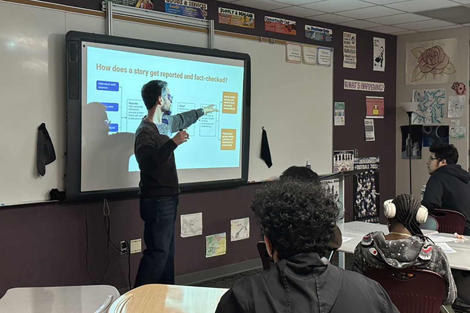 IPB News managing editor Scott Cameron presents to students at Ben Davis High School. Scott is a White man with dark hair and streaks of white.